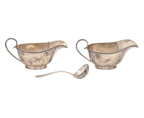 A pair of George V silver sauceboats, 16cm l, by George Wish &amp; Co Ltd, Sheffield 1931 and a silver sauce ladle by another