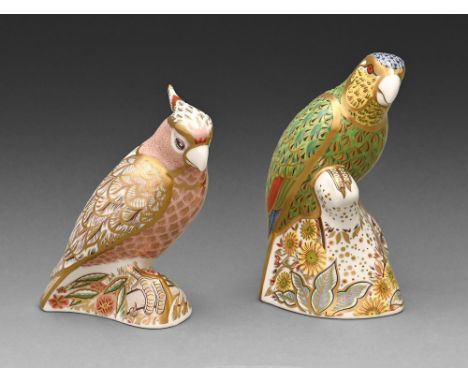 Two Royal Crown Derby Amazon Green Parrot and Cockatoo paperweights, early 20th c, 13.5 and 15.5cm diam, printed mark and pai