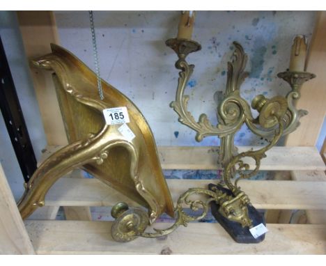 GILDED SHELF UNIT AND WALL LIGHTING