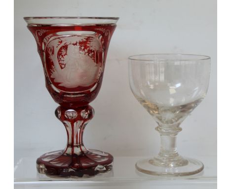 19th century Bohemian ruby flashed goblet with etched panel depicting an embracing couple with bird cage and dead bird and fu