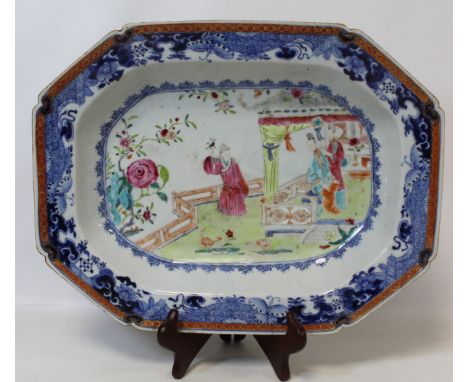 Late 18th century Chinese export meat dish of octagonal form, the central famille rose panel depicting figures on a terrace s