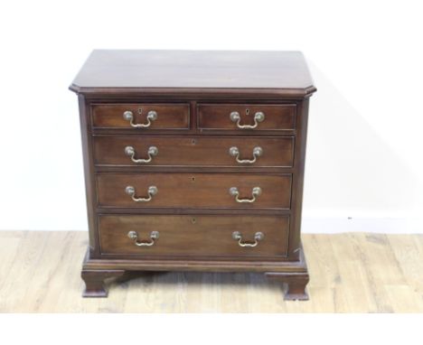 19th century mahogany chest in the George III style, short and three long drawers with canted corners on ogee bracket feet. 7