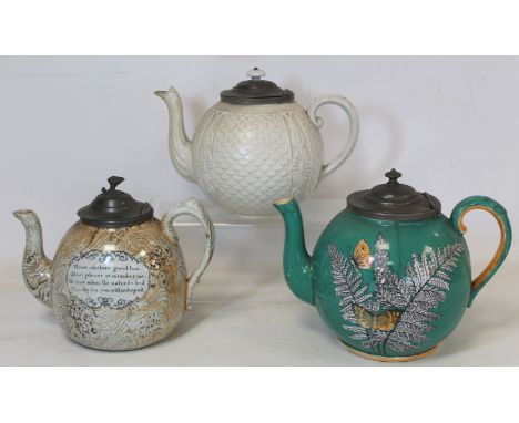 Three Victorian pottery teapots: one with lustre scumble effect transfer ground with verse "Happy may you be and long may you