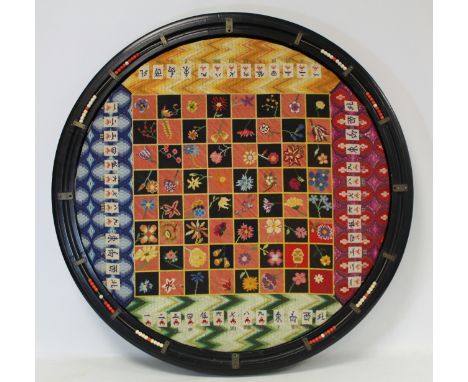 Mid 20th century circular tapestry Mahjong table top board worked in polychrome silk threads with flowers and tiles on geomet