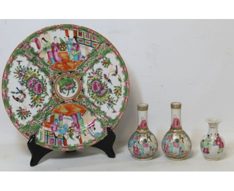 Late 19th/early 20th century Chinese famille rose porcelain plate with alternating panels of figures in an interior and birds