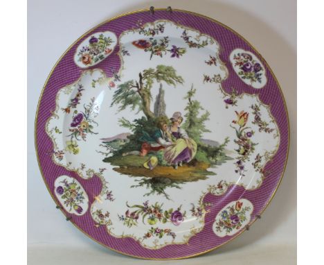 Large 19th century Dresden Helena Wolfsohn porcelain charger with painted polychrome panel depicting a courting couple surrou