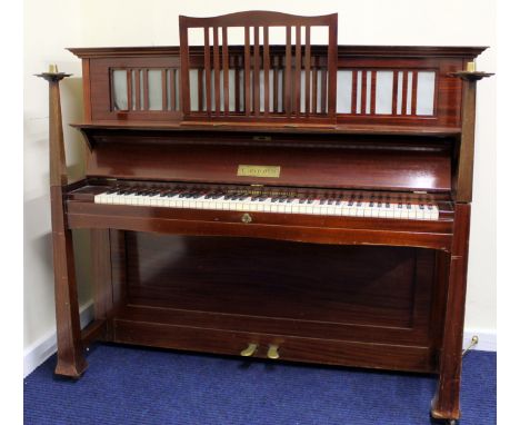 Bechstein 'The Medieval Model' upright piano in an Arts and Crafts style case, with extended front candle supports, strap wor