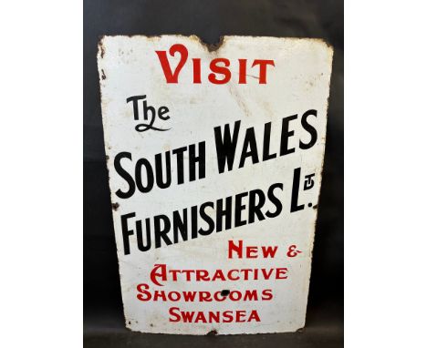 A rectangular enamel sign advertising The South Wales Furnishers Ltd. Swansea, 20 x 30". 