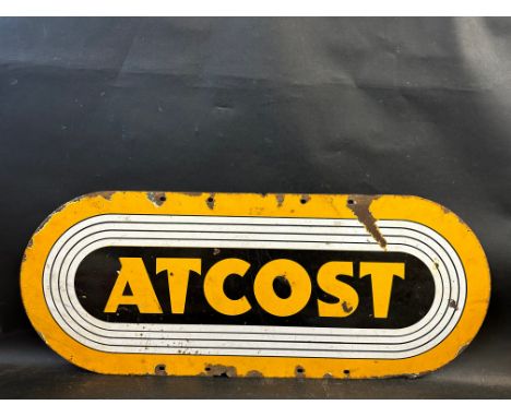 An Atcost enamel sign, 30 x 12". 