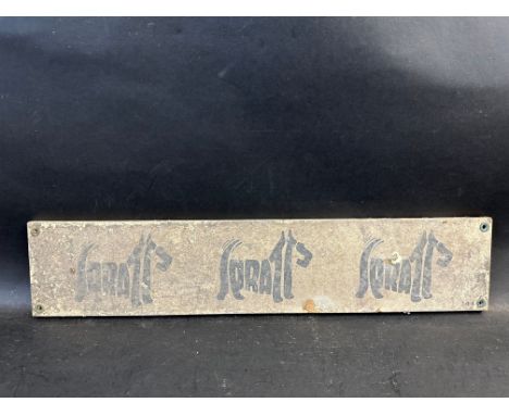 A Spratts enamel sign, the words Spratts formed by three dogs in a row, 20 x 4".