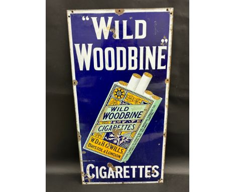 A Wills 'Wild Woodbine' pictorial packet enamel sign, an early and heavy example in good condition, 18 x 36".
