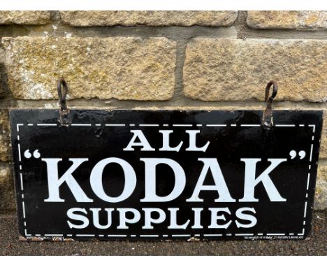 A good double sided enamel sign advertising Kodak Supplies, by Bruton of Palmers Green, good gloss, 28 x 12 1/2" (excluding h
