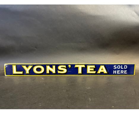 A Lyons' Tea Sold Here shelf strip, 19 3/4" long.