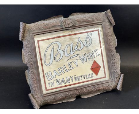 A Bass' Barley Wine advertising mirror in original branded Art Nouveau copper embossed frame with easel stand, 13 1/2 x 12". 