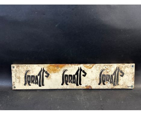 A Spratts enamel sign, the words Spratts formed by three dogs in a row, 20 x 4".