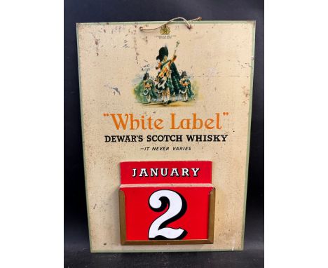 A Dewar's Scotch Whisky White Label tin calendar with inserts (unchecked), 11 1/4 x 15 3/4". 