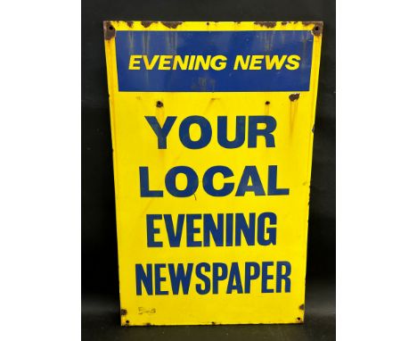An Evening News rectangular enamel sign, 16 1/2 x 26". 
