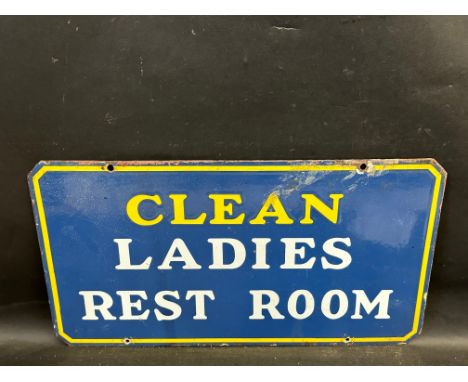 A double sided enamel sign: 'Clean Ladies Rest Room', 20 x 11". 