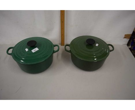 Two green Le Creuset double handled cooking pots