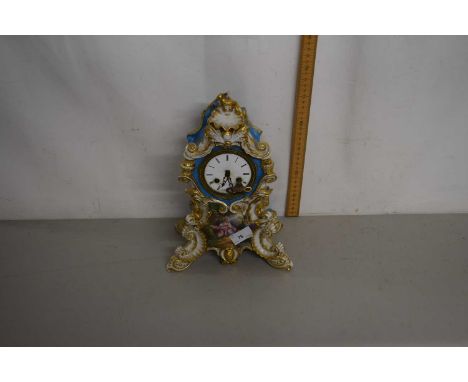French porcelain cased mantel clock, the face signed Duville Fargon a Boulogne