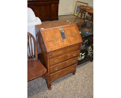 Georgian style small walnut veneered bureau with step and well interior, fitted with brass handles