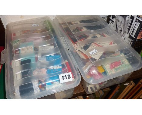 Two boxes containing vintage needle and thread packets, with other sewing accessories