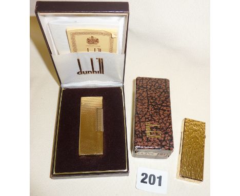 Gold plated Dunhill Rollagas lighter in lightly used condition, in original case with paperwork, and another similar