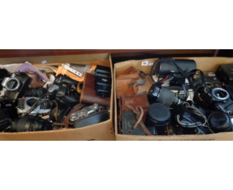 Two large boxes of assorted cameras, camera bodies and lenses