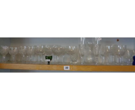 Shelf of cut and engraved crystal glassware