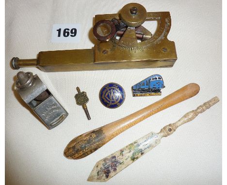 Stanley brass inclinometer, enamel badges, Mauchline Ware Sandown bookmark, carved bone letter opener with Stanhope of Teignm