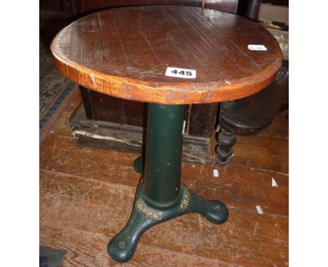 Old Singer sewing stool with cast iron base