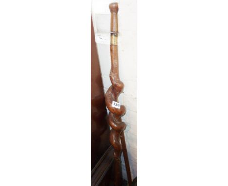 Naive carved walking stick with thick spiral stem