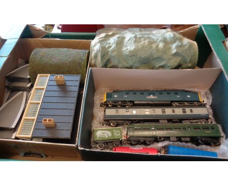 A Lima diesel railway engine, a Triang similar with rolling stock, station etc