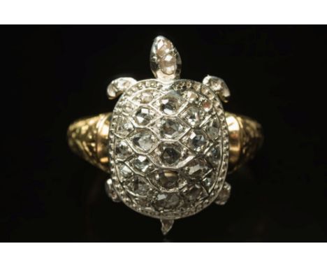 A rose diamond mounted 'tortoise' cluster ring:, the realistically modelled tortoise with rose diamond-set shell on a shank w