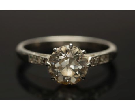 A platinum and diamond single-stone ring:, the round old European cut stone, approximately 7.3mm x 4.5mm, estimated to weigh 