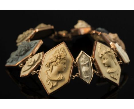 A late 19th century gold and lava cameo portrait panel bracelet:, the graduated lozenge-shaped panels with female portraits.