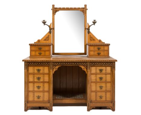 A late Victorian ash and inlaid bedroom suite in the Aesthetic taste:, with walnut banded geometric lozenge friezes, bordered