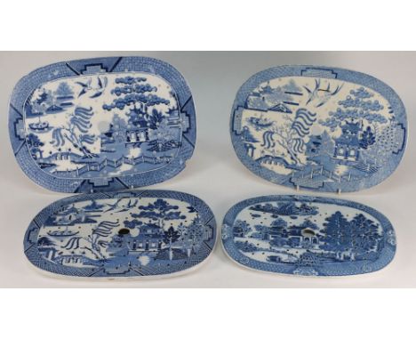 A group of four pottery and pearlware drainers: comprising a Spode example in the Forest Landscape pattern and three printed 