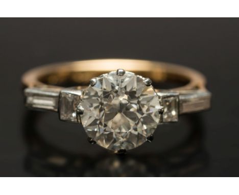 A diamond single-stone ring: with round old  brilliant-cut diamond approximately 8.1mm x 5.3mm estimated to weigh 2.2cts in s