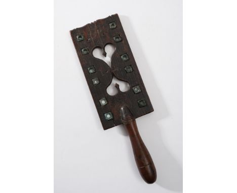An early 19th century treen love token: possibly Welsh, the rectangular board with pierced double heart-shaped centre and two