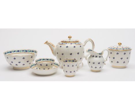 An extensive Caughley 'French Sprig' porcelain tea and coffee service: of fluted form, painted with sprigs and bands of cornf