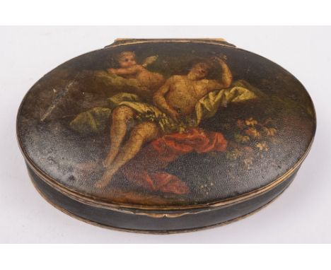 A late Georgian faux tortoiseshell snuff box: of circular outline, the hinged top decorated with a classical nude female and 