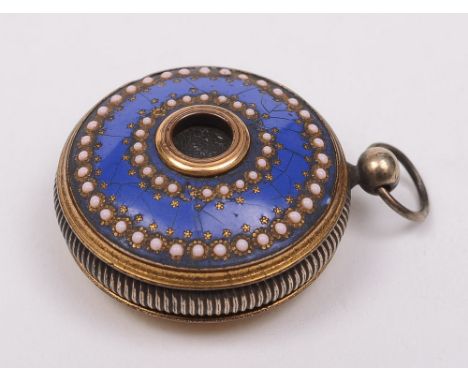 An early 19th century gilt metal and enamel spyglass: of circular form with four draw tube having white beaded decoration to 