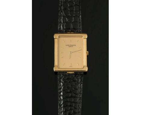 Patek Philippe. A gentleman's 18ct gold Patek Philippe dress wristwatch: model number 3775, the rectangular gold colour dial 