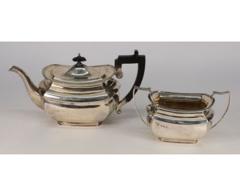 An Edwardian silver two-piece tea service, maker Elkington & Co, Birmingham 1909:, of barge shaped outline, with gadrooned bo