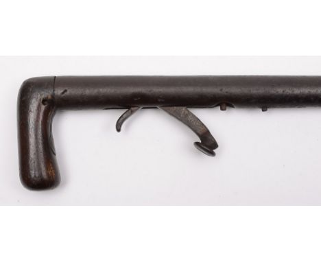 A 19th century percussion walking stick gun: with hammer activated trigger, and wood grip, 86cm. long.