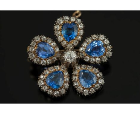 A late 19th century gold, silver, sapphire and diamond cinquefoil brooch: each petal with a single pear-shaped sapphire withi