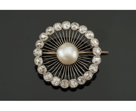 An early 20th century pearl and diamond circular brooch:, the central baroque pearl (untested) approximately 9.8mm diameter, 