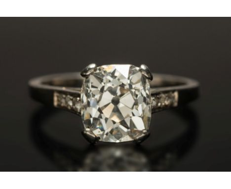 A diamond single-stone ring: with cushion shaped old brilliant-cut diamond approximately 8.1mm long x 7.3 wide x 5.5mm deep, 