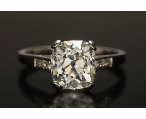 A diamond single-stone ring: with cushion shaped old brilliant-cut diamond approximately 8.1mm long x 7.3 wide x 5.5mm deep, 